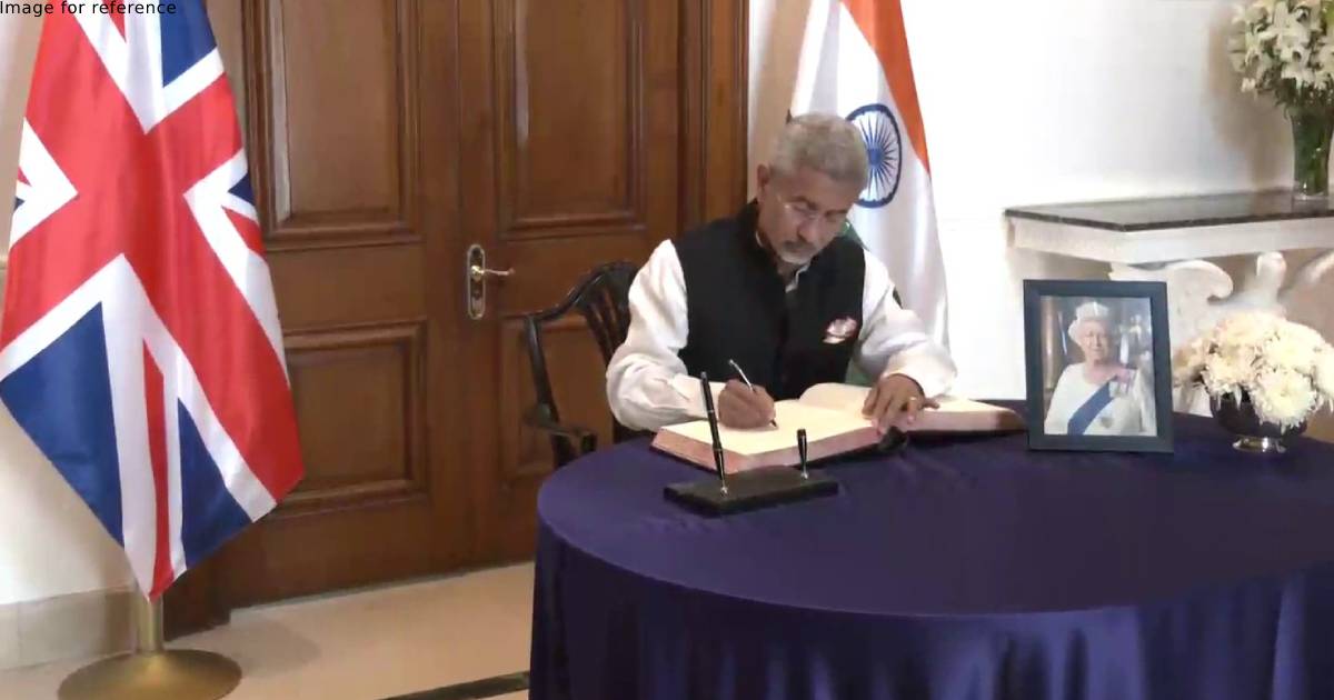 Jaishankar signs the condolence book for Queen Elizabeth II at British High Commissioner's residence